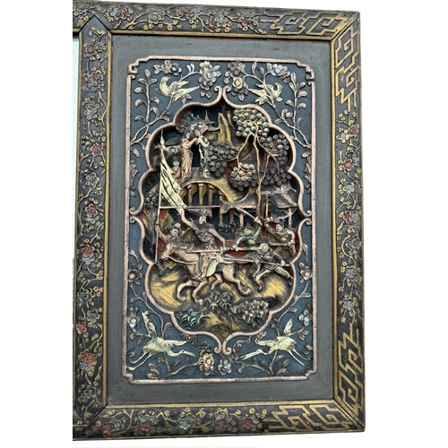 6A - A 19TH CENTURY CHINESE CARVED GILTWOOD AND PAINTED HARDWOOD MIRROR
The frame decorated with trees an... 