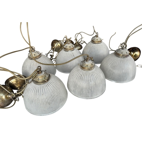 131A - A SET OF SIX 20TH CENTURY RIBBED GLASS AND BRASS CEILING LIGHTS AND FITTINGS.
(diameter 21.5cm)