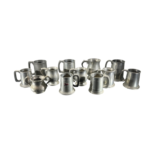 149A - A COLLECTION OF TWENTY-EIGHT 20TH CENTURY PEWTER TANKARDS
To include examples from Pinder Bros, Rand... 