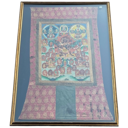 218 - A LARGE 19TH CENTURY TIBETAN PART SILK AND WATERCOLOUR HEIGHTENED WITH WITH GILT, THANGKA PAINTING O... 