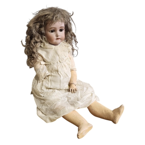 139A - KÄMMER & REINHARDT AND SIMON & HALBIG, A LARGE LATE 19TH CENTURY GERMAN BISQUE DOLL.
(approx 65cm)