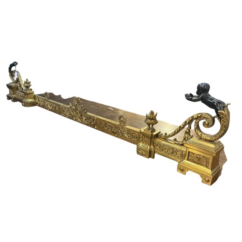 186 - A 19TH CENTURY FRENCH LOUIS XVI DESIGN GILT AND PATINATED BRONZE ANDIRONS
The ends with two putti on... 