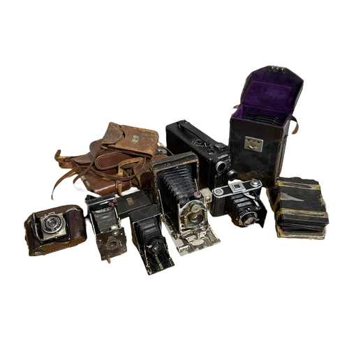 123A - A COLLECTION OF SIX LATE 19TH/20TH CENTURY CAMERAS
Comprising Kodak Compur. Voigtlander prontor II, ... 