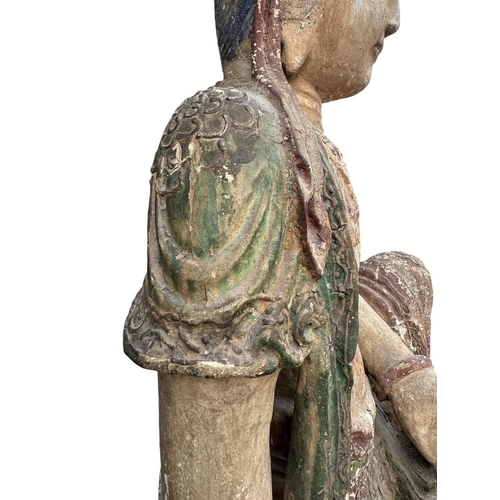 400 - A LARGE AND IMPRESSIVE CHINESE MING DYNASTY POLYCHROME-PAINTED CARVED WOOD FIGURE OF GUANYIN
The bod... 