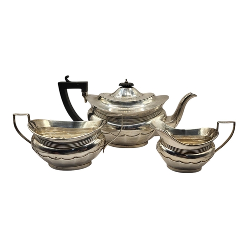 11 - CHARLES S. GREEN & CO. LTD, A GEORGE V SILVER THREE PIECE TEA SERVICE, BIRMINGHAM, 1919
Comprising t... 