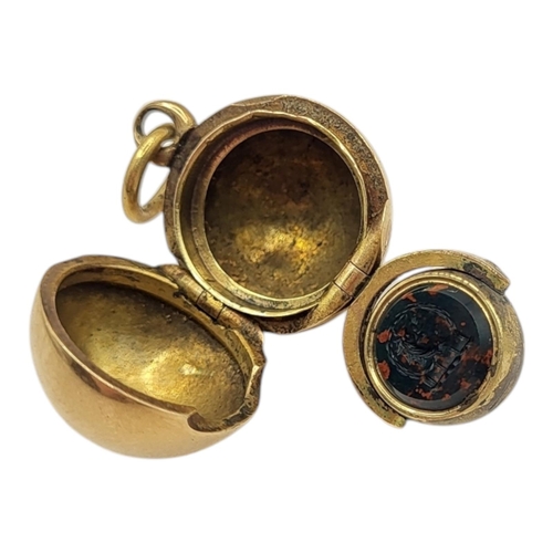 120 - UNUSUAL 19TH CENTURY YELLOW METAL BALL LOCKET WITH SWIVEL FOB/SEAL (YELLOW METAL TESTED AS 14CT GOLD... 