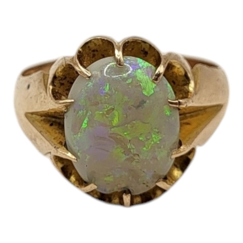 144 - A LARGE LATE VICTORIAN/EARLY EDWARDIAN 9CT GOLD AND OPAL SOLITAIRE RING
Having oval cabochon cut opa... 