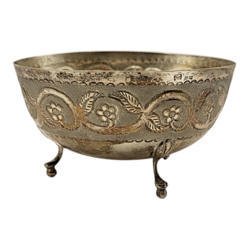 151 - A 20TH CENTURY CYPRIOT SILVER FOOTED BOWL
Having chased floral and foliage decoration on textured gr... 