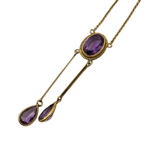 180 - A LATE VICTORIAN/EARLY EDWARDIAN 9CT GOLD AND AMETHYST PENDANT NECKLACE
Having oval cut amethyst (ap... 