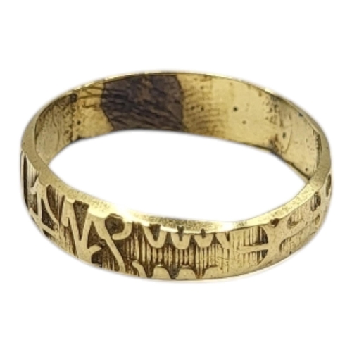 20 - AN UNUSUAL 20TH CENTURY YELLOW METAL RUNIC SCRIPT RING (YELLOW METAL TESTED AS 14CT GOLD)
Having cha... 