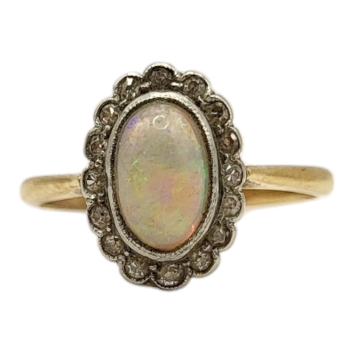 24 - AN ART DECO PERIOD YELLOW METAL, OPAL AND DIAMOND CLUSTER RING (YELLOW METAL TESTED AS 18CT GOLD)
Ha... 