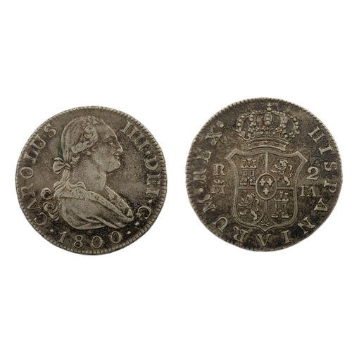 266 - AN EARLY 19TH CENTURY SPANISH CHARLES VI SILVER 2 REALES COIN, DATED 1800
Draped bust of King Charle... 