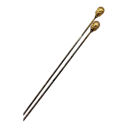 36 - A LATE 19TH/EARLY 20TH CENTURY PAIR OF 9CT GOLD FINIAL HAT PINS
Having stylised crown and ball finia... 