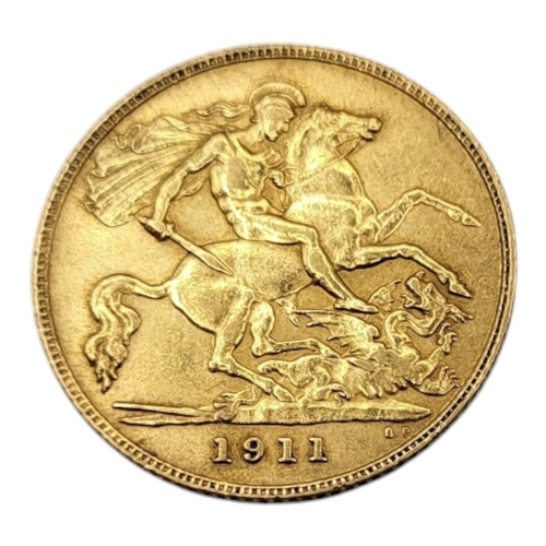 303 - A 22CT GOLD GEORGE V HALF SOVEREIGN, DATED 1911
Bust facing right.
(diameter 19mm, 4g)