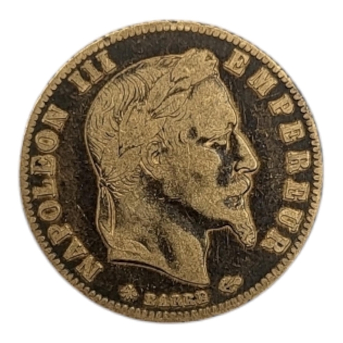 304 - A FRENCH 21CT GOLD NAPOLEON III 5 FRANCS COIN, DATED 1867
Bust facing right. 
(diameter 17mm, 1.6g)