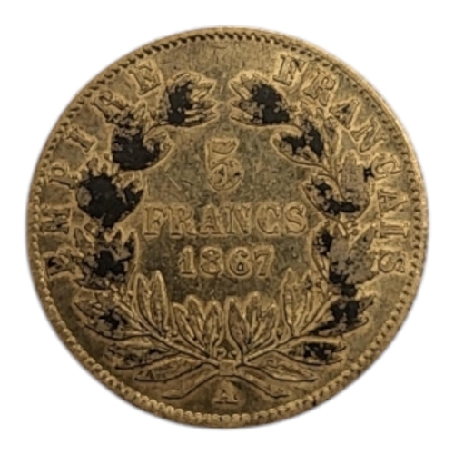 304 - A FRENCH 21CT GOLD NAPOLEON III 5 FRANCS COIN, DATED 1867
Bust facing right. 
(diameter 17mm, 1.6g)