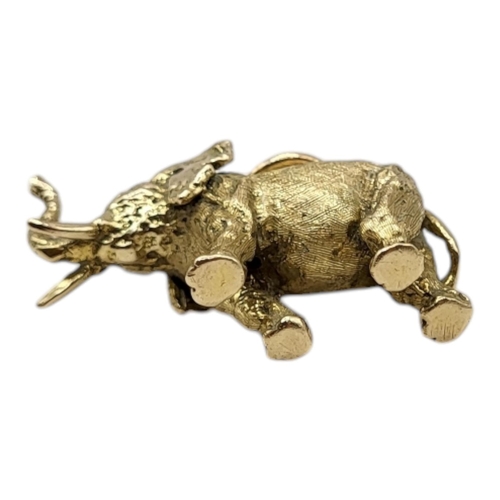 38 - GEORG JENSEN, A LARGE 9CT GOLD ELEPHANT CHARM, HALLMARKED LONDON, 1965
Having chased textured finish... 