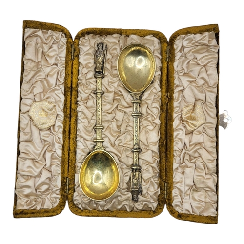 61 - A PAIR OF LATE 19TH CENTURY DUTCH SILVER GILT APOSTLE ANOINTING SPOONS, HAVING ST. BARTHOLOMEW & ST.... 