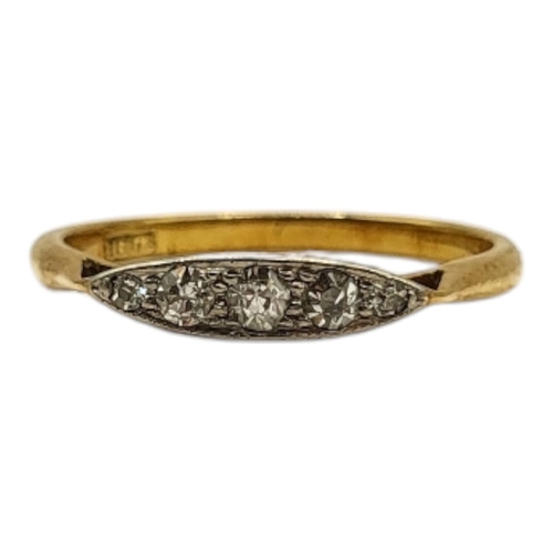 62 - AN 18CT YELLOW GOLD AND DIAMOND RING
Having marquise front set with five graduated round cut diamond... 