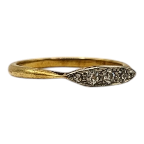 62 - AN 18CT YELLOW GOLD AND DIAMOND RING
Having marquise front set with five graduated round cut diamond... 