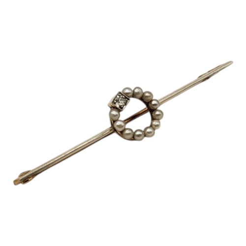 80 - A 15CT GOLD AND PLATINUM, PEARL AND DIAMOND BAR BROOCH
Having a formed halo front, consisting of a r... 