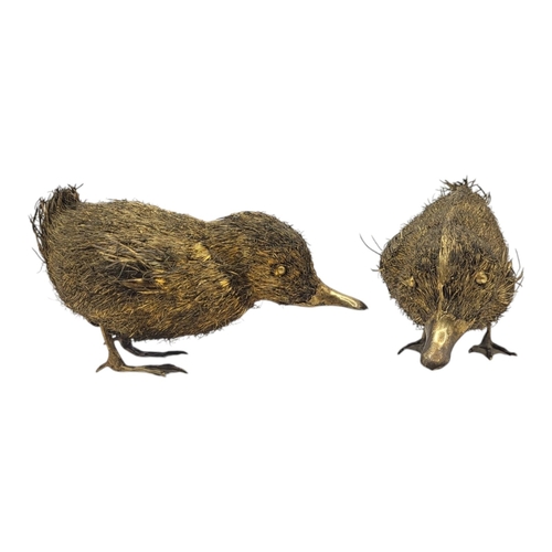 99 - MARIO BUCCELLATI, ITALY, TWO 20TH CENTURY ITALIAN SILVER GILT DUCKLINGS
Having silver gilt wire bodi... 