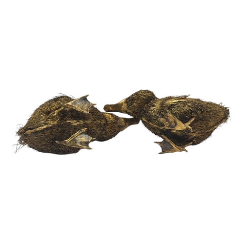 99 - MARIO BUCCELLATI, ITALY, TWO 20TH CENTURY ITALIAN SILVER GILT DUCKLINGS
Having silver gilt wire bodi... 