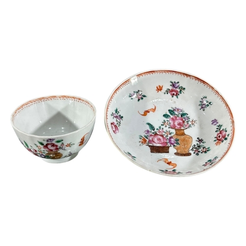 394 - A CHINESE QING DYNASTY FAMILLE ROSE PORCELAIN TEA BOWL AND SAUCER
Decorated with floral sprays and w... 