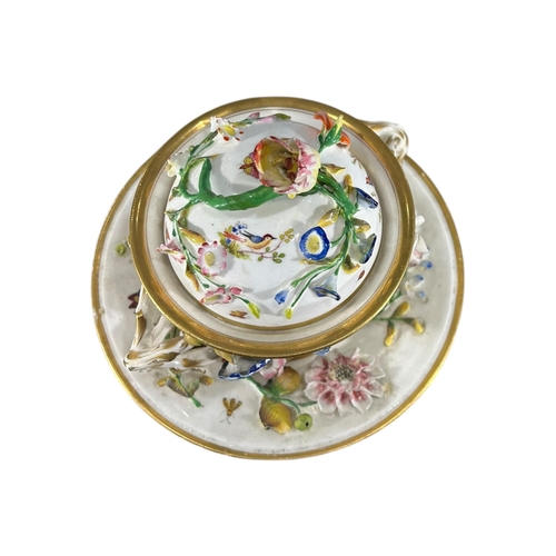 416 - COALBROOKDALE, AN EARLY 19TH CENTURY COALPORT PORCELAIN TWIN HANDLED LIDDED POT AND SAUCER
Decorated... 