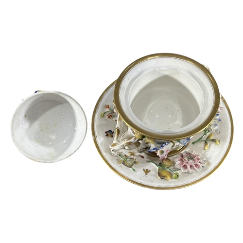 416 - COALBROOKDALE, AN EARLY 19TH CENTURY COALPORT PORCELAIN TWIN HANDLED LIDDED POT AND SAUCER
Decorated... 