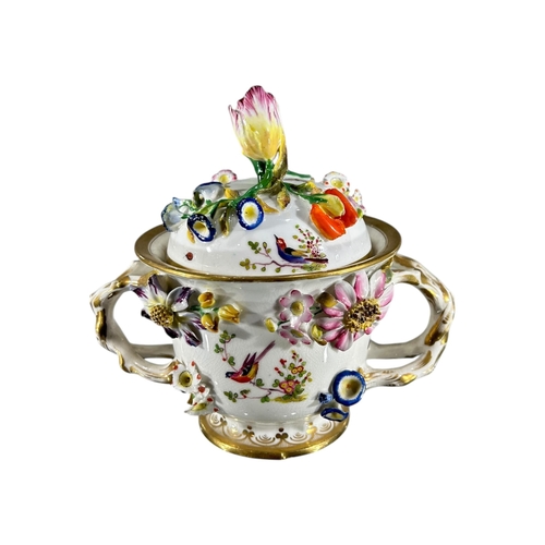 416 - COALBROOKDALE, AN EARLY 19TH CENTURY COALPORT PORCELAIN TWIN HANDLED LIDDED POT AND SAUCER
Decorated... 