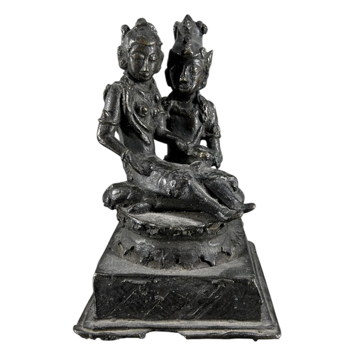 423 - AN UNUSUAL LATE 19TH CENTURY OR EARLIER INDIAN BRONZE FIGURAL GROUP DEPICTING SHIVA & PARVATI, PROBA... 