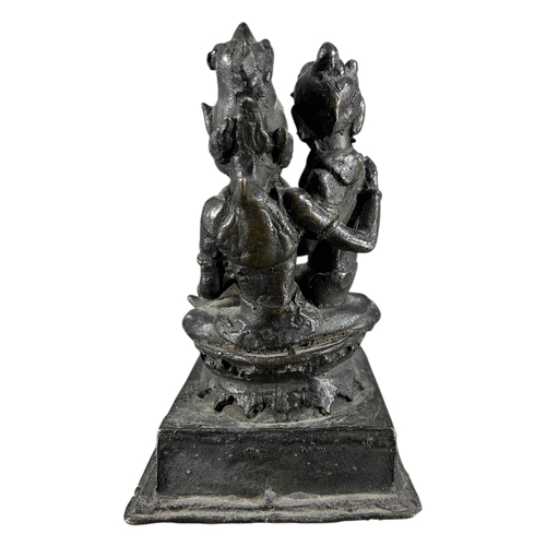 423 - AN UNUSUAL LATE 19TH CENTURY OR EARLIER INDIAN BRONZE FIGURAL GROUP DEPICTING SHIVA & PARVATI, PROBA... 