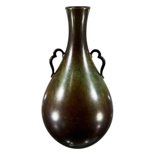 427 - JUST ANDERSEN, DANISH, 1884 - 1943, AN EARLY 20TH CENTURY TWIN HANDLE BRONZE BOTTLE VASE, CIRCA 1920... 