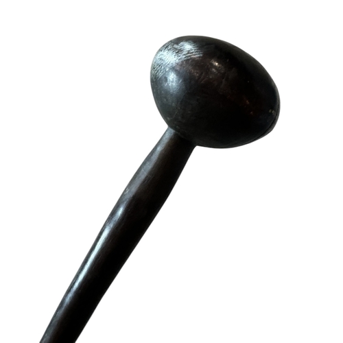 406 - A LATE 19TH/EARLY 20TH CENTURY AFRICAN WOODEN KNOBKERRIE WAR CLUB (POSSIBLY ZULU).
(length 65cm)