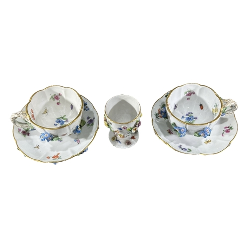 409 - A 20TH CENTURY PAIR OF MEISSEN PORCELAIN CABINET CUPS AND SAUCERS AND ASSOCIATED EGG CUP
Having appl... 