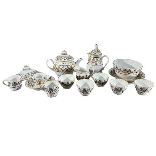 414 - A LATE 18TH/EARLY 19TH CENTURY CHAMBERLAIN WORCESTER PART TEA SET
Having floral gilt decoration, com... 