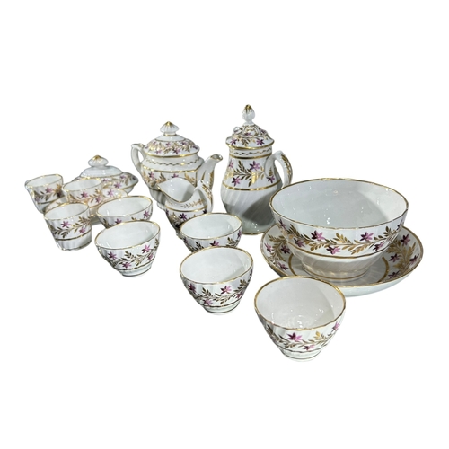 414 - A LATE 18TH/EARLY 19TH CENTURY CHAMBERLAIN WORCESTER PART TEA SET
Having floral gilt decoration, com... 