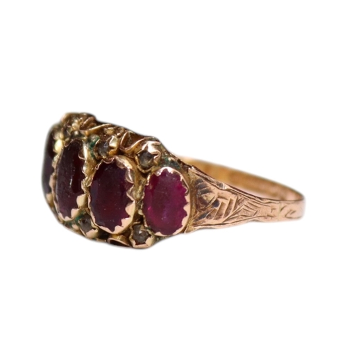 26 - SOLOMON HENRY SCHWERSEE. EDWARDIAN 9CT GOLD, GARNET AND DIAMOND RING, HALLMARKED BIRMINGHAM 1906. Ha... 