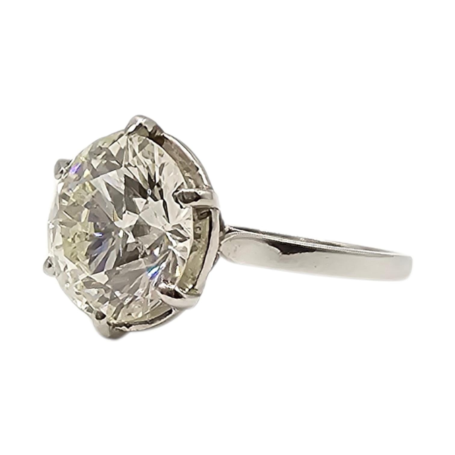 A WHITE METAL AND 4CT NATURAL DIAMOND SOLITAIRE RING (WHITE METAL ...