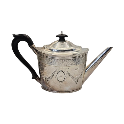502 - HENRY CHAWNER & JOHN EAMES, A LATE 18TH CENTURY GEORGE III SILVER TEAPOT
Hallmarked London, 1797, ov... 