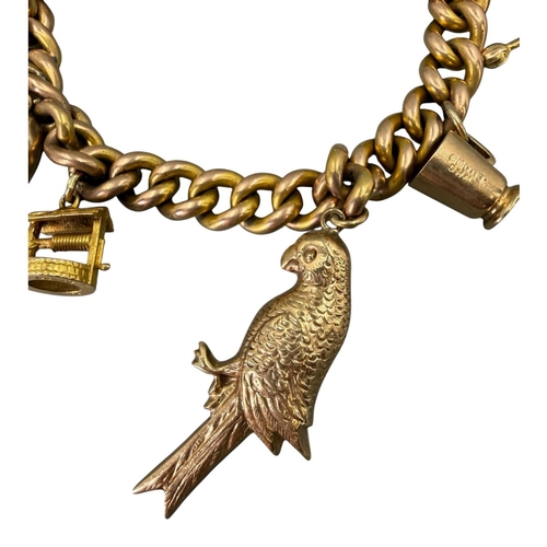 505 - 20TH CENTURY 9CT GOLD CURB LINK CHARM BRACELET WITH ATTACHED 9CT GOLD CHARMS
Heart lock clasp with m... 