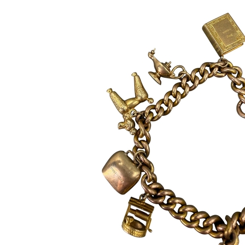 505 - 20TH CENTURY 9CT GOLD CURB LINK CHARM BRACELET WITH ATTACHED 9CT GOLD CHARMS
Heart lock clasp with m... 