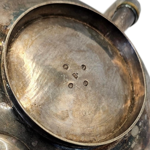 506 - PATRICK LOUGHLIN, A 19TH CENTURY WILLIAM IV IRISH SILVER TEAPOT
Hallmarked Dublin, 1835, wide compre... 