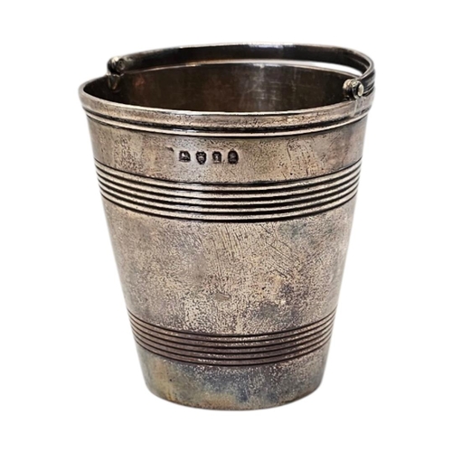 510 - AN EARLY 19TH CENTURY GEORGE III SILVER CREAM PALE
Hallmarked London, 1804, bucket form with reeded ... 
