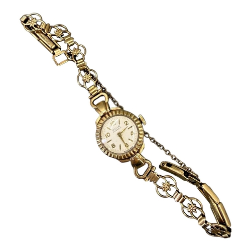 515 - AVIA, 9CT GOLD LADIES’ WRISTWATCH
Hallmarked Birmingham, 1956, having beige steel dial with gold ton... 