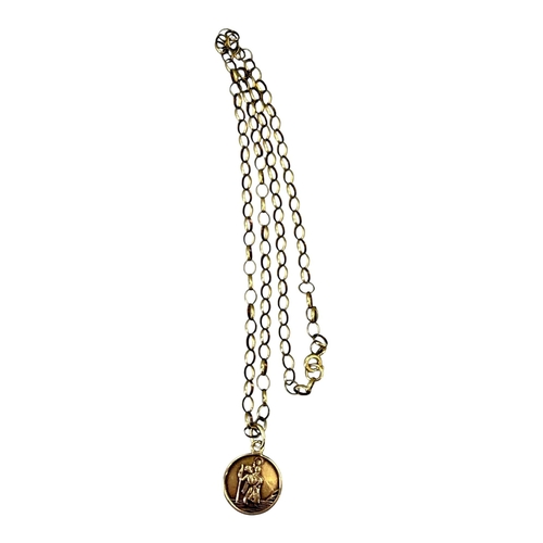 517 - W.J. SUTTON LTD, A MID 20TH CENTURY 9CT GOLD ST. CHRISTOPHER PENDANT
Hallmarked Birmingham, 1958, at... 