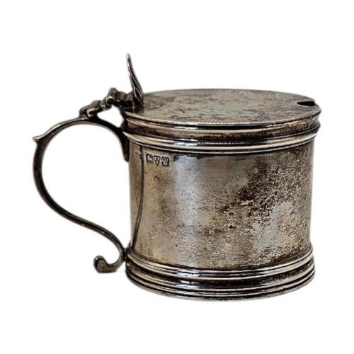 518 - STOKES & IRELAND LTD, A LARGE EDWARDIAN STYLE SILVER MUSTARD POT
Hallmarked Chester, 1920, plain cyl... 