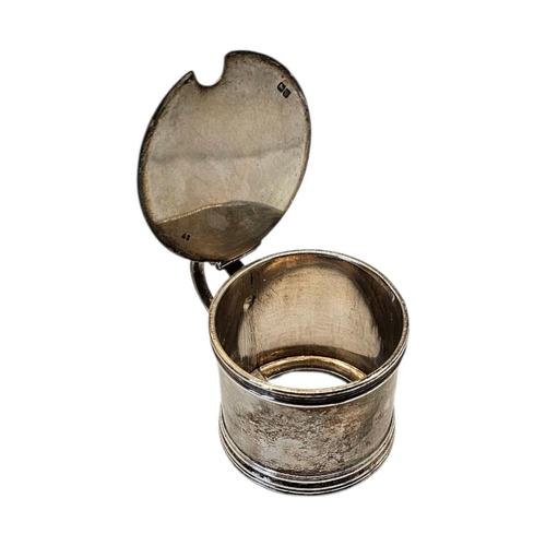 518 - STOKES & IRELAND LTD, A LARGE EDWARDIAN STYLE SILVER MUSTARD POT
Hallmarked Chester, 1920, plain cyl... 