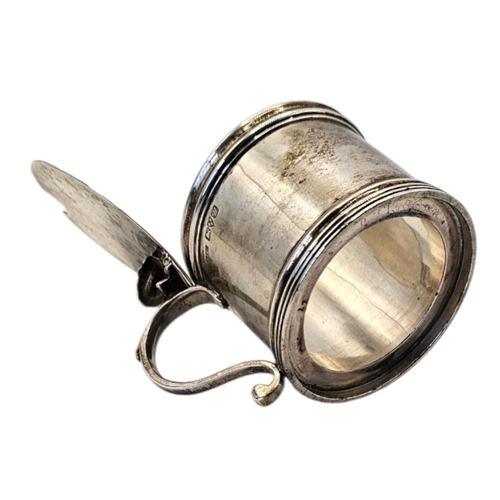 518 - STOKES & IRELAND LTD, A LARGE EDWARDIAN STYLE SILVER MUSTARD POT
Hallmarked Chester, 1920, plain cyl... 